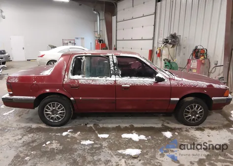 1990 Dodge Spirit z USA, uszkodzony, nr VIN 1B3XA46K0LF742798